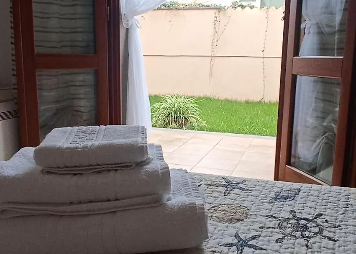 Апартаменты Casa Lilla 1 E 2 Casa Indipendente Con Giardino Ористано