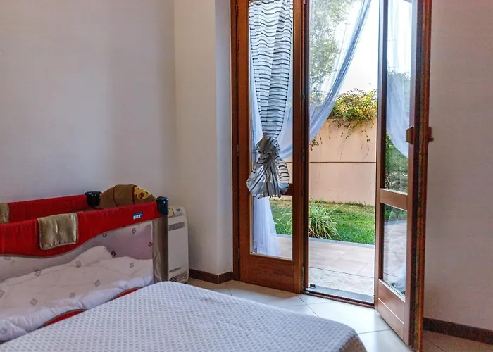 Апартаменты Casa Lilla 1 E 2 Casa Indipendente Con Giardino Ористано